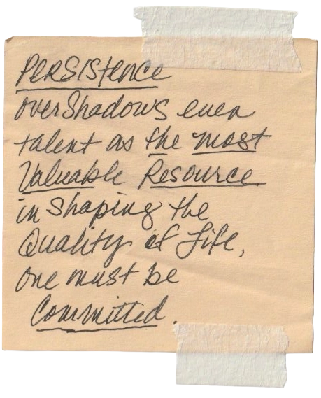 Handwritten quote on a piece of paper with tape, on a white background. It reads persistence overshadows even talent as the most valuable resource and shaping the quality of life, one must be committed.