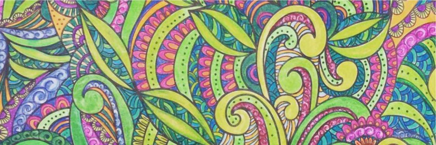 Colorful paisley pattern with vibrant green, pink, and blue colors. By Penelope Wrenn